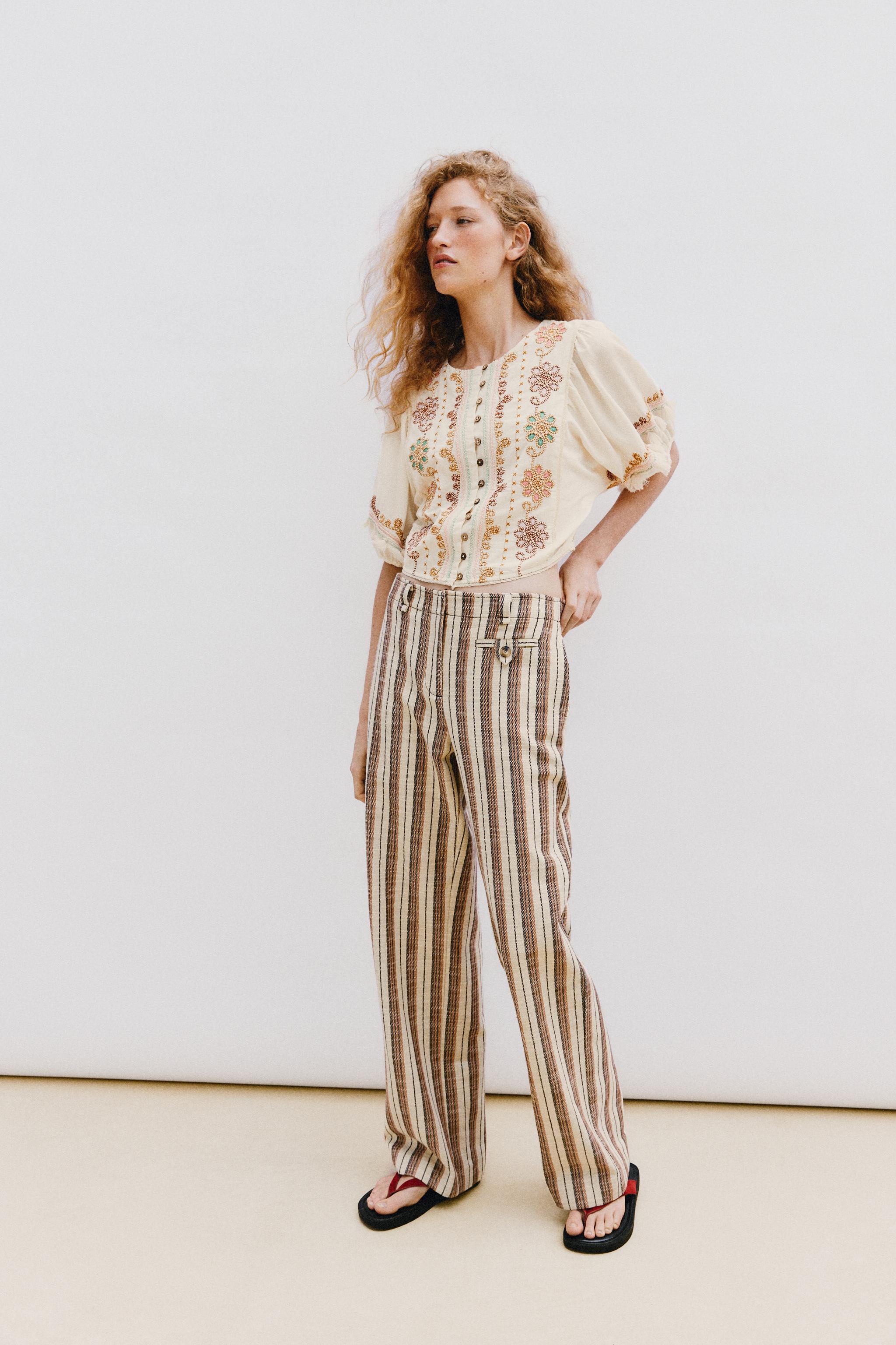 EMBROIDERED FRINGE BLOUSE